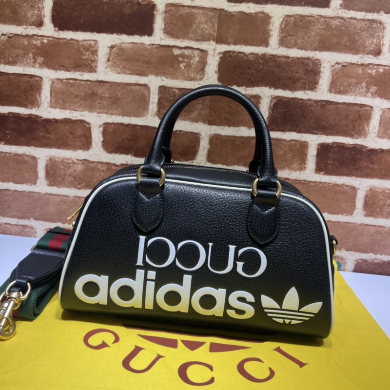 G*u*i top handle bags
